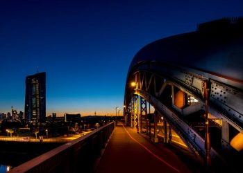 Shares higher in Europe as traders digest monetary response from governments and central bankers