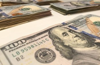 Dollar loses ground to other currencies as risk appetite continues